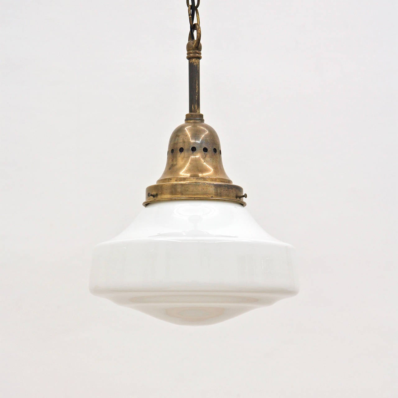 Rare and elegant Austrian Jugendstil pendant with opaline glass and brass hardware. Very good condition with age related patina to the brass. The original light socket takes one E27 bulb. We can provide any length of chain to fit your needs at no