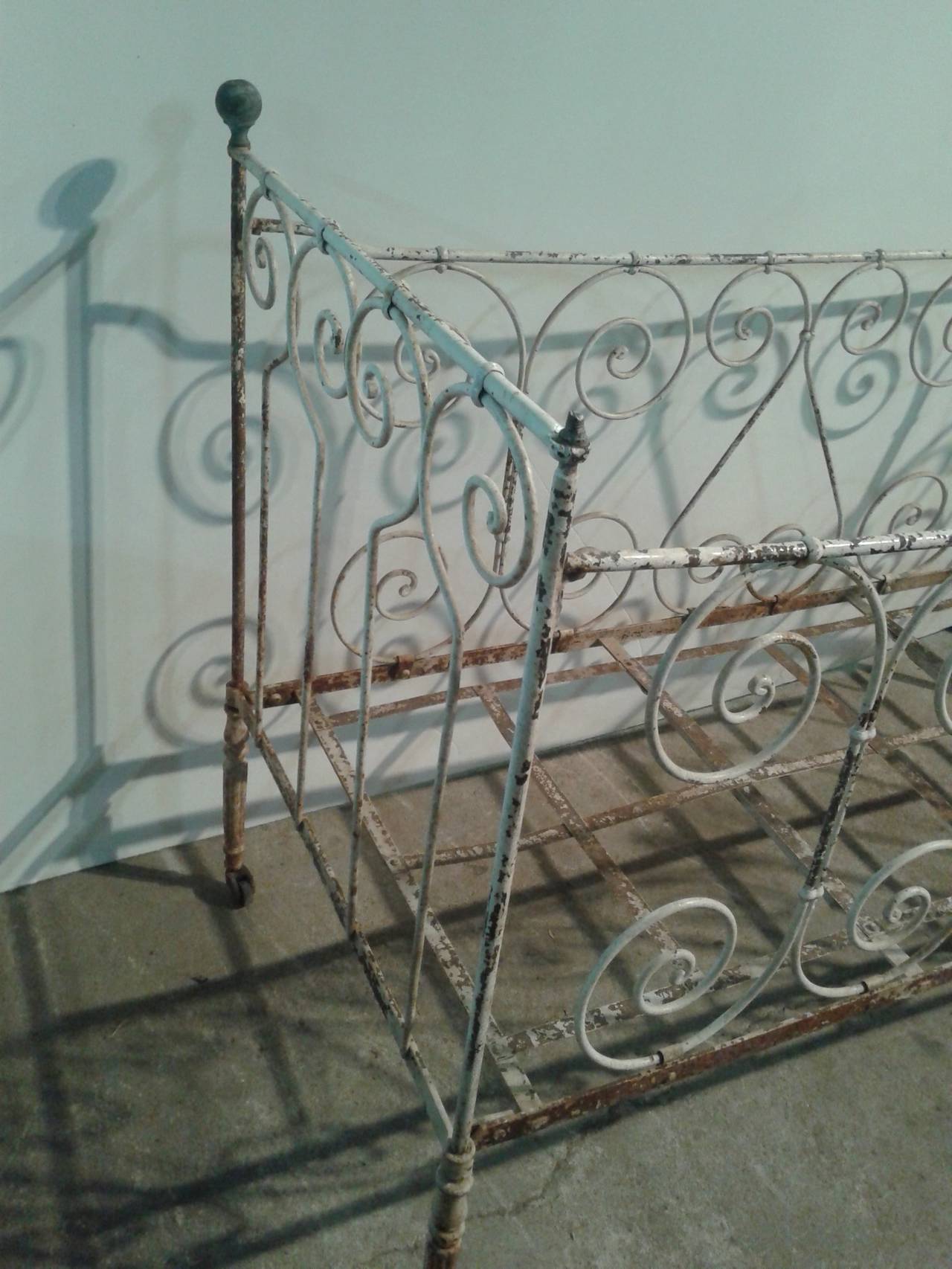 Antique French Wrought Iron Scroll Baby Bed on Casters For Sale 1
