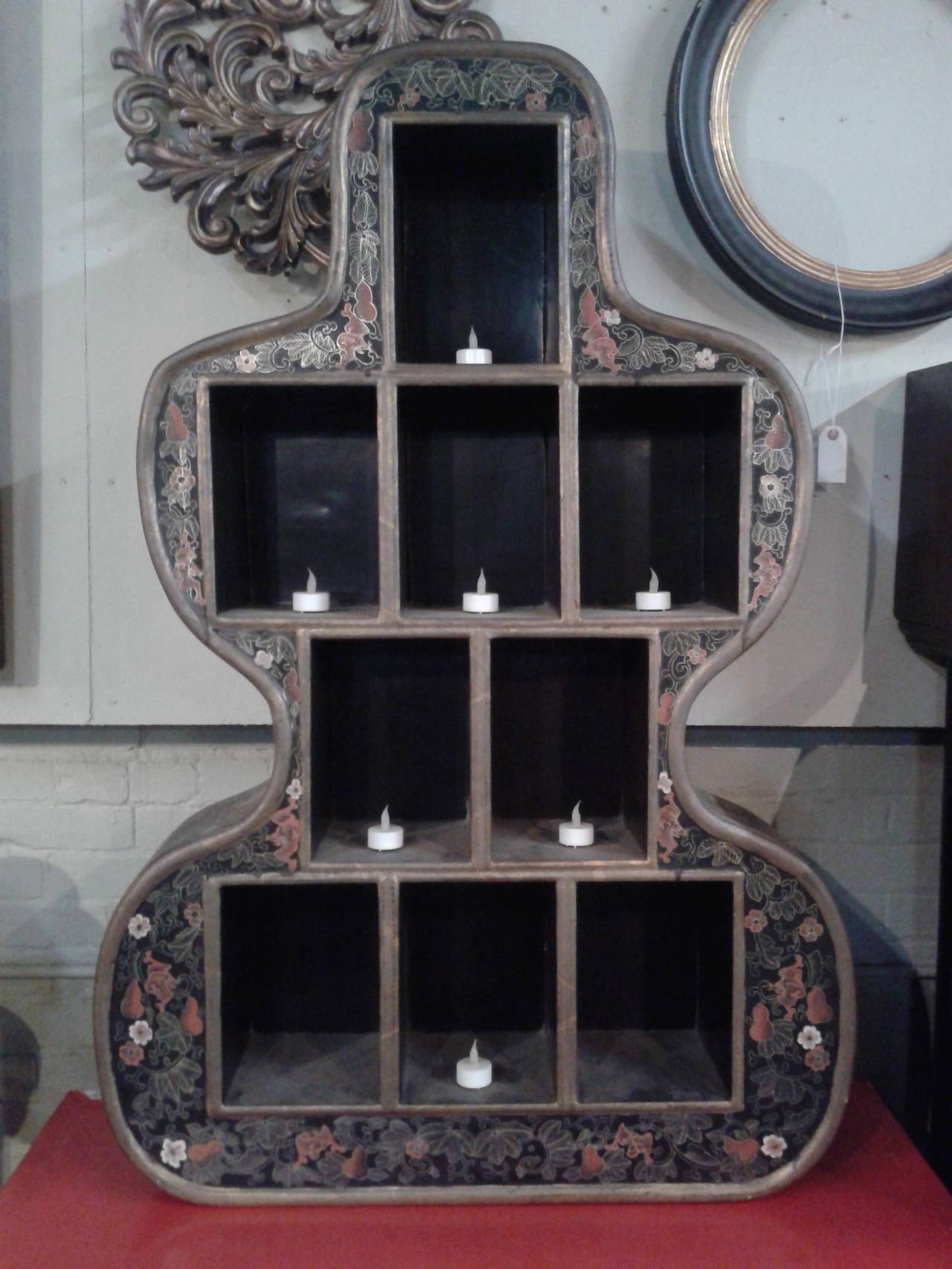 9 Compartment Vintage shadow Box with Asian Motif in excellent condition. Flame less candles not included. Sits on a flat surface without additional support.