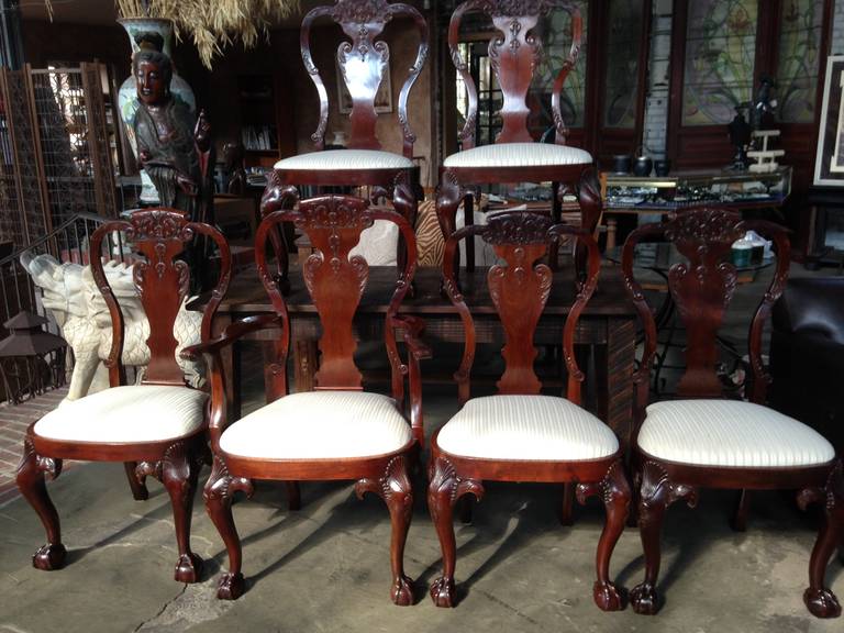 Set of Late Georgian Chippendale Ball & Claw Feet Carved Mahogany Chairs that are suspected to be older than 1820.  Excellent condition for their appraised age.  Professional appraisal value from 2013 was 26,000.  Two of the chairs have metal