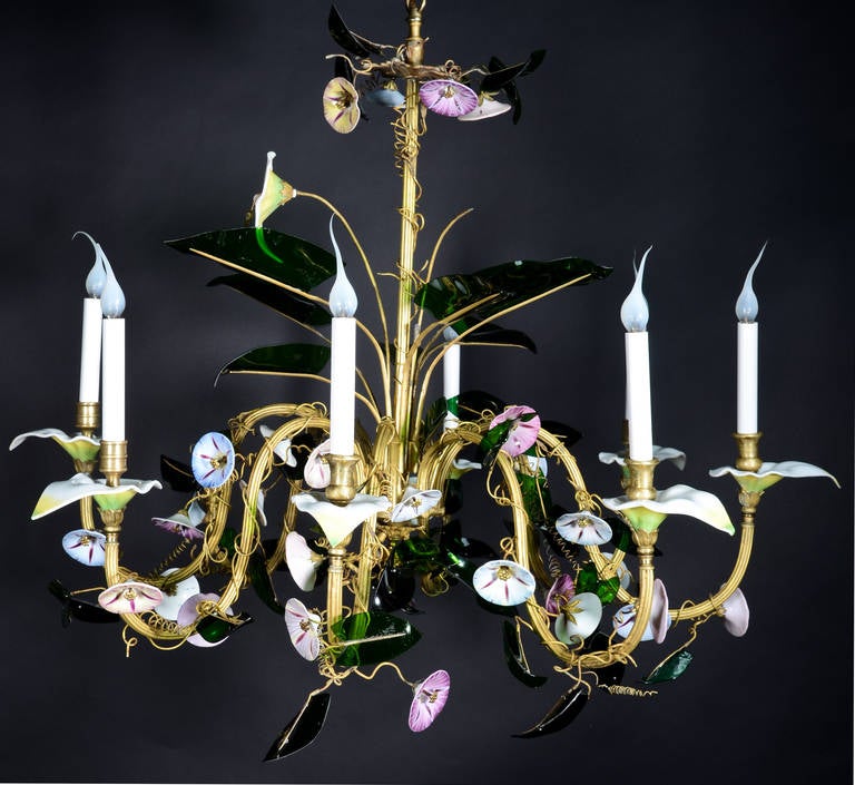An unusual Antique Austrian Viennese polychromed enameled glass, opaline glass and gilt brass chandelier embellished with flowers and gilt decorated green glass leaves.