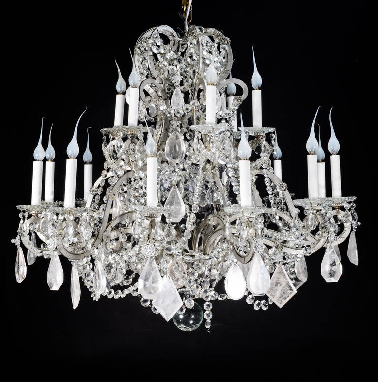 French Louis XVI style silvered metal, cut rock crystal, crystal and glass double-tier multi-light chandelier.