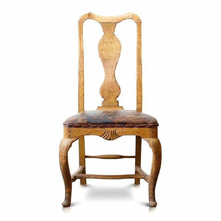 18th century Swedish rococo chair in original color and leather seat in great proportions and patina.