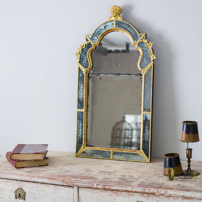 A Swedish etched and engraved Baroque glass mirror attributed to Burchard Precht. 
 
The Precht family is synonymous with the production of mirrors of the highest quality in 18th century Sweden, numerous examples having been attributed to Burchard