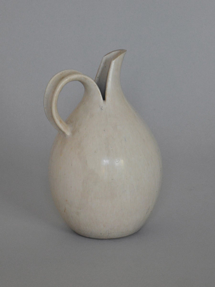 Saxbo split pitcher in stoneware decorated with white hare’s fur glaze. Stamped Saxbo, Copenhagen.

We ship this item world wide, please write to contact@apetersen.dk for shipping options and prices.