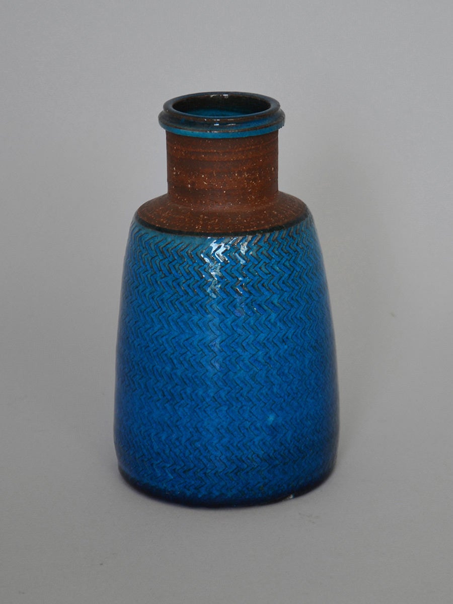 Vase in stoneware with blue salt glaze. Signed with monogram and stamped Denmark.

We ship this item world wide, please write to contact@apetersen.dk for shipping options and prices.