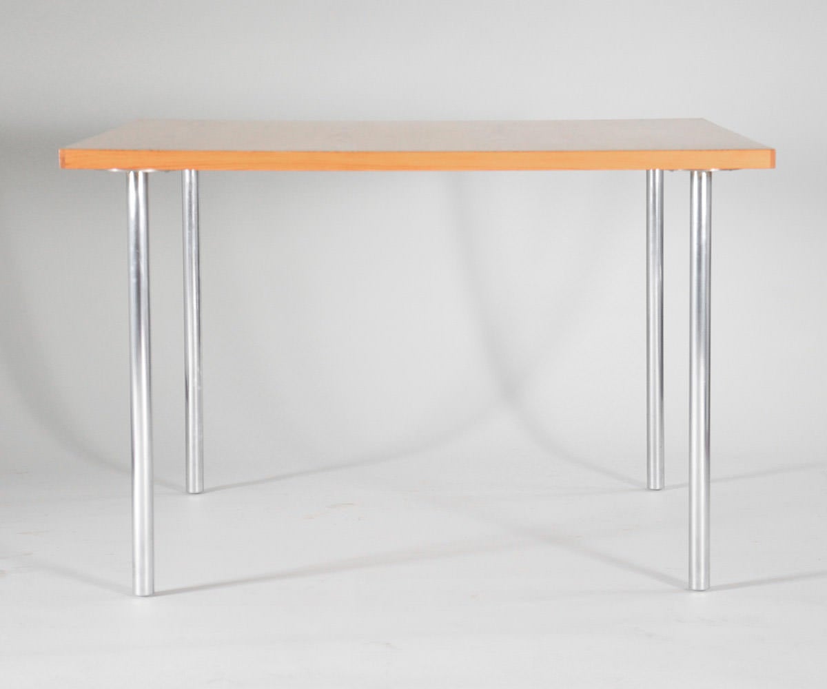 PK-44 Square working / dining table with an Oregon pine plate, mounted on steel legs. Designed in 1956. Produced and stamped by E. Kold Christensen.

We ship this item world wide, please write to contact@apetersen.dk for shipping options and