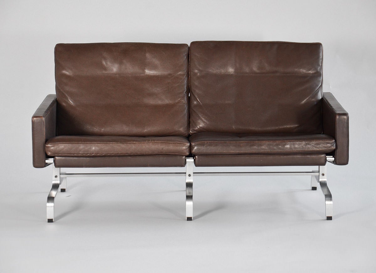 PK-31, Model PK-31/2 Two-seater sofa with matt chromed spring steel, upholstered in brown leather. Designed in 1964, made and stamped by E. Kold Christensen.

We ship this item world wide, please write to contact@apetersen.dk for shipping options