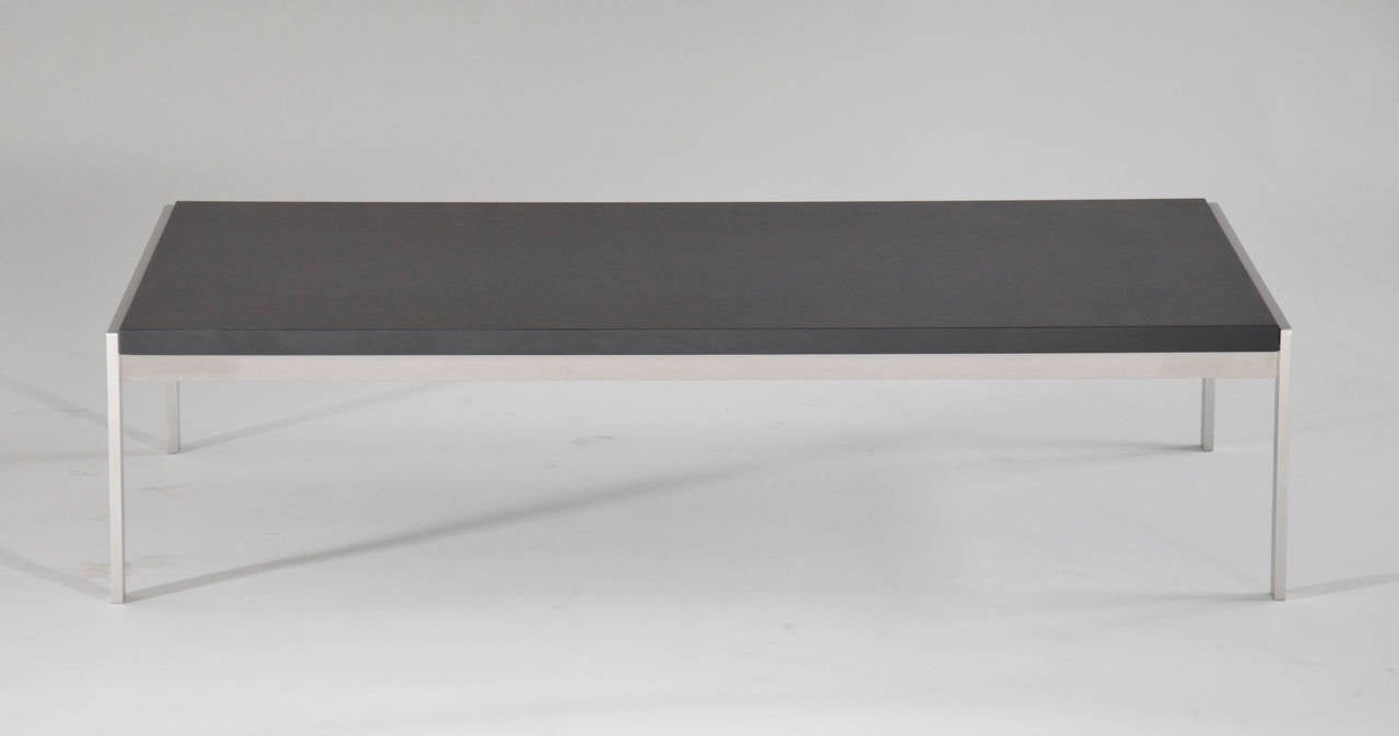 PK-63 Coffee table with a plate in black slate. Frame made of satin-brushed stainless steel. Designed in 1968. Manufactured and stamped by Kjærholm Production

We ship this item world wide, please write to contact@apetersen.dk for shipping options