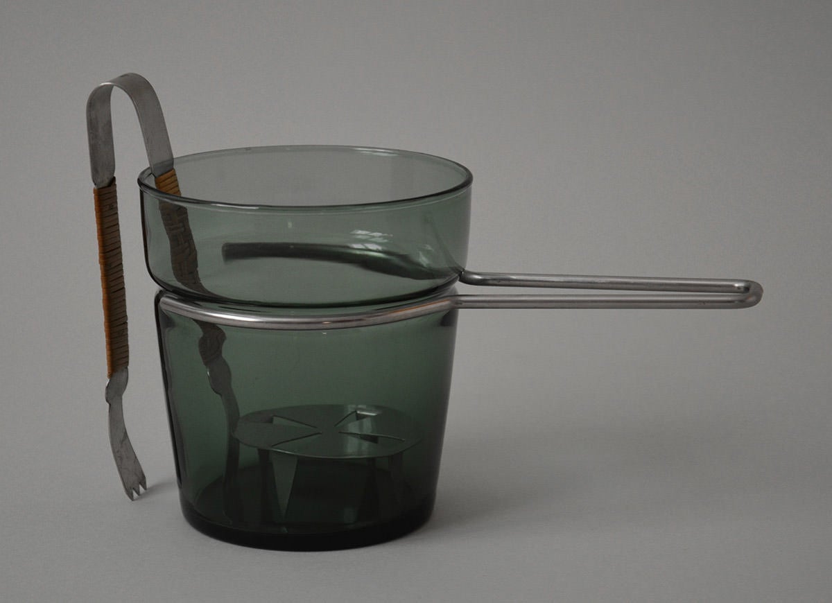 Danish Design. Ice bowl in greenish glass, fitted with handle of steel. Supplied with ice tong of steel with wickerwork. Manufactured in Denmark.

We ship this item world wide, please write to contact@apetersen.dk for shipping options and prices.