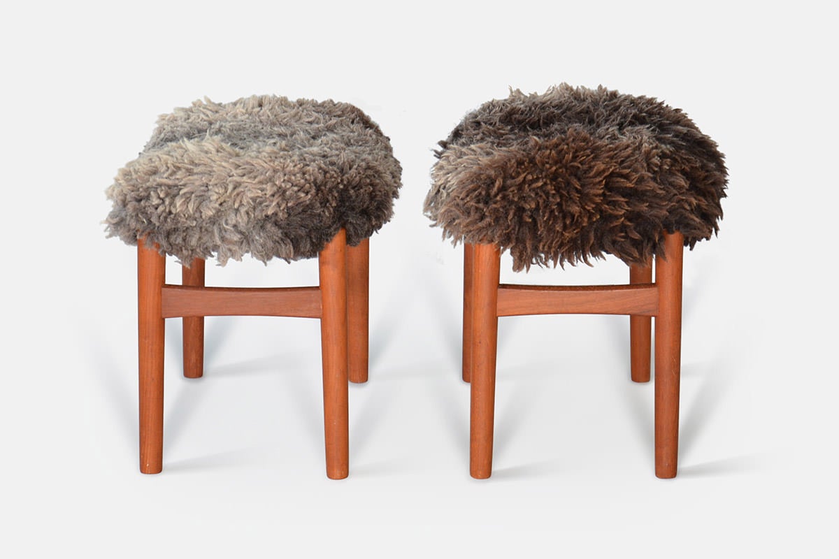 Danish furniture design. A couple of stools with legs in stained teak wood, upholstered with brown lambskin.

We ship this item worldwide, please contact for shipping options and prices.