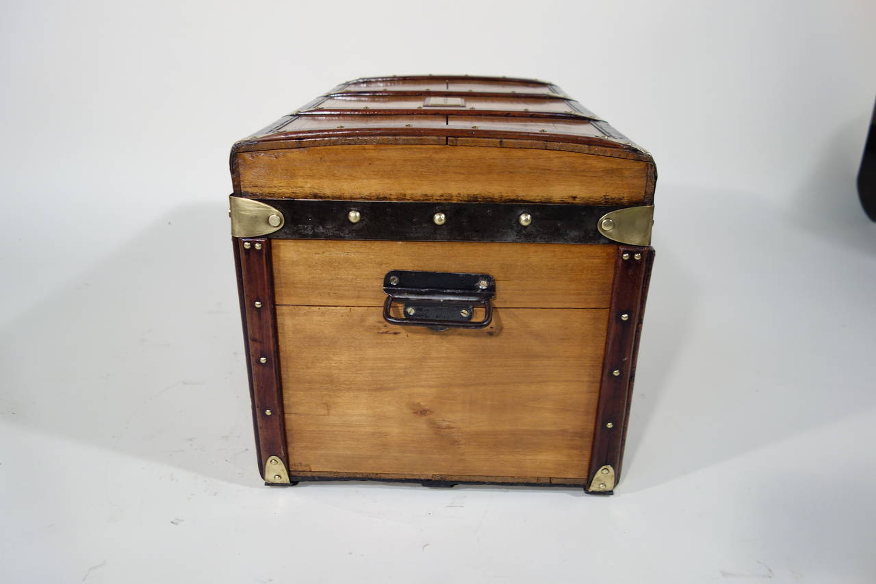 Late 19th Century 1890s French Wood Trunk, Curved Varnished For Sale