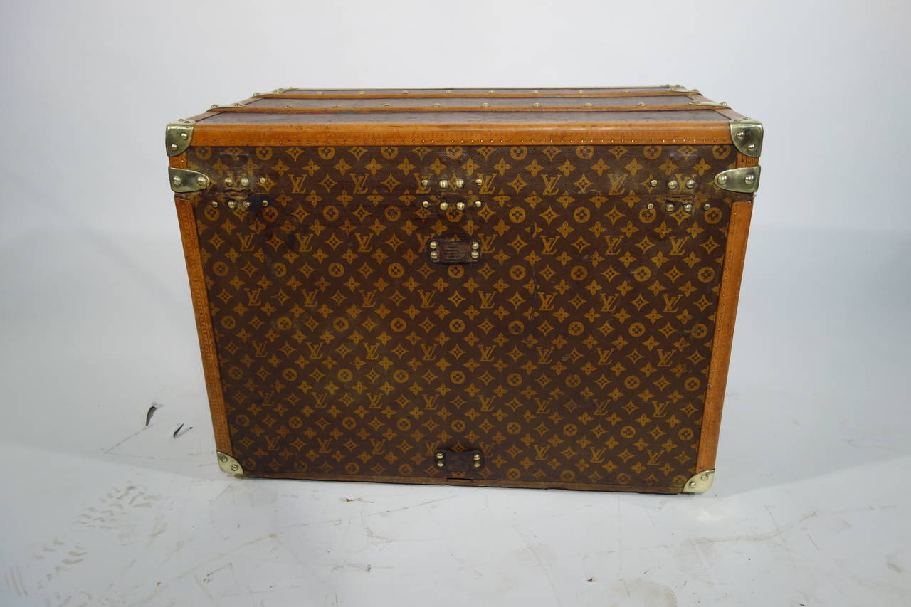 Louis Vuitton women hats trunk
 with monogram initial H.B.E.

Interior with two completely original frames.

Brass jewelry.

Leather handles (one not original).

Dimensions in cm 75 cm wide x 56 cm high x 49 deep.

All the trunks we sell