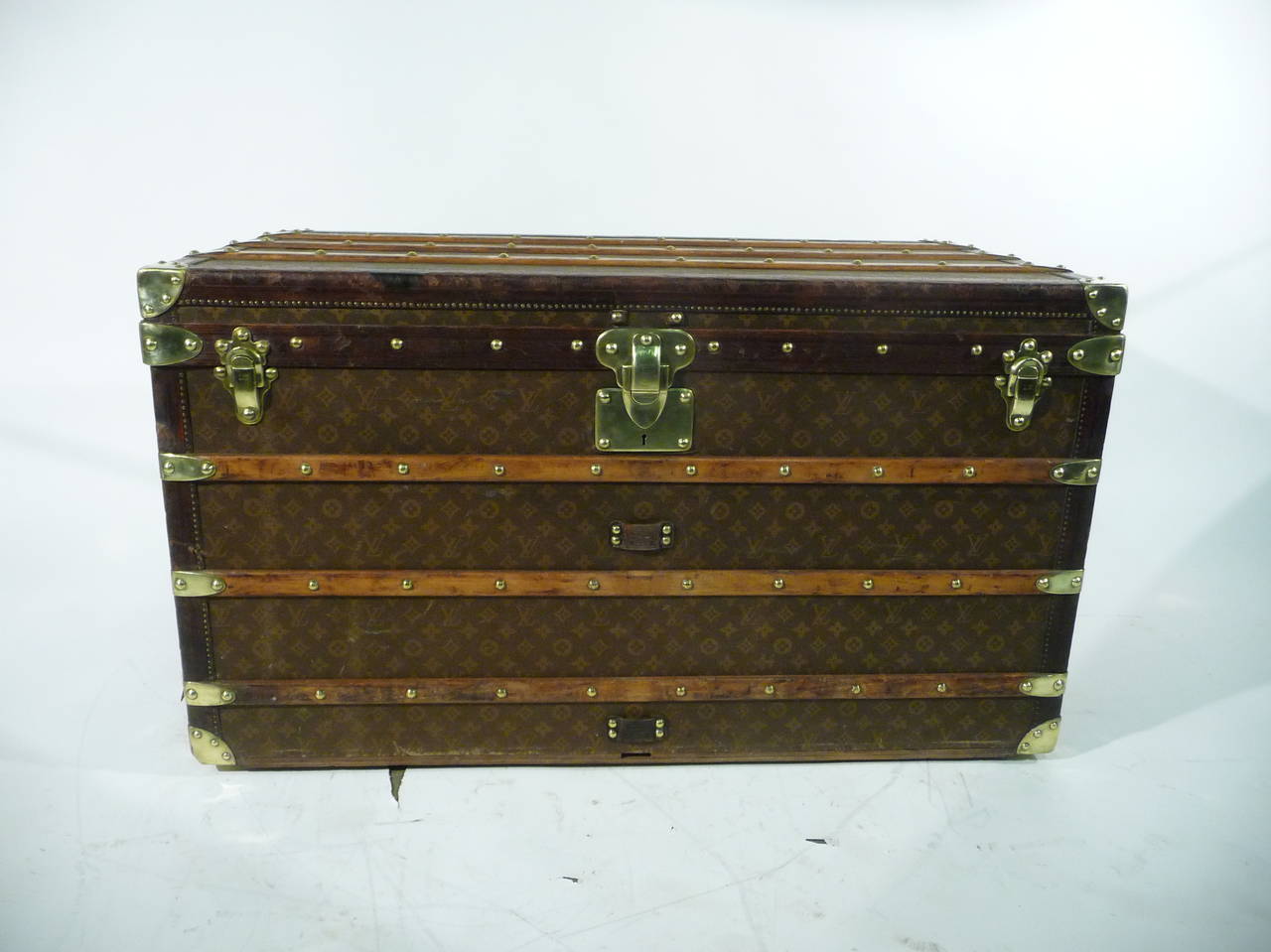 Louis Vuitton monogram trunk 
First series, First choice 

- Borders leather (not Lozine) 
- Handles brass 
The drawer or tray was remade in accordance with the original, but the inside of the trunk is original. By aileurs no restoration done,