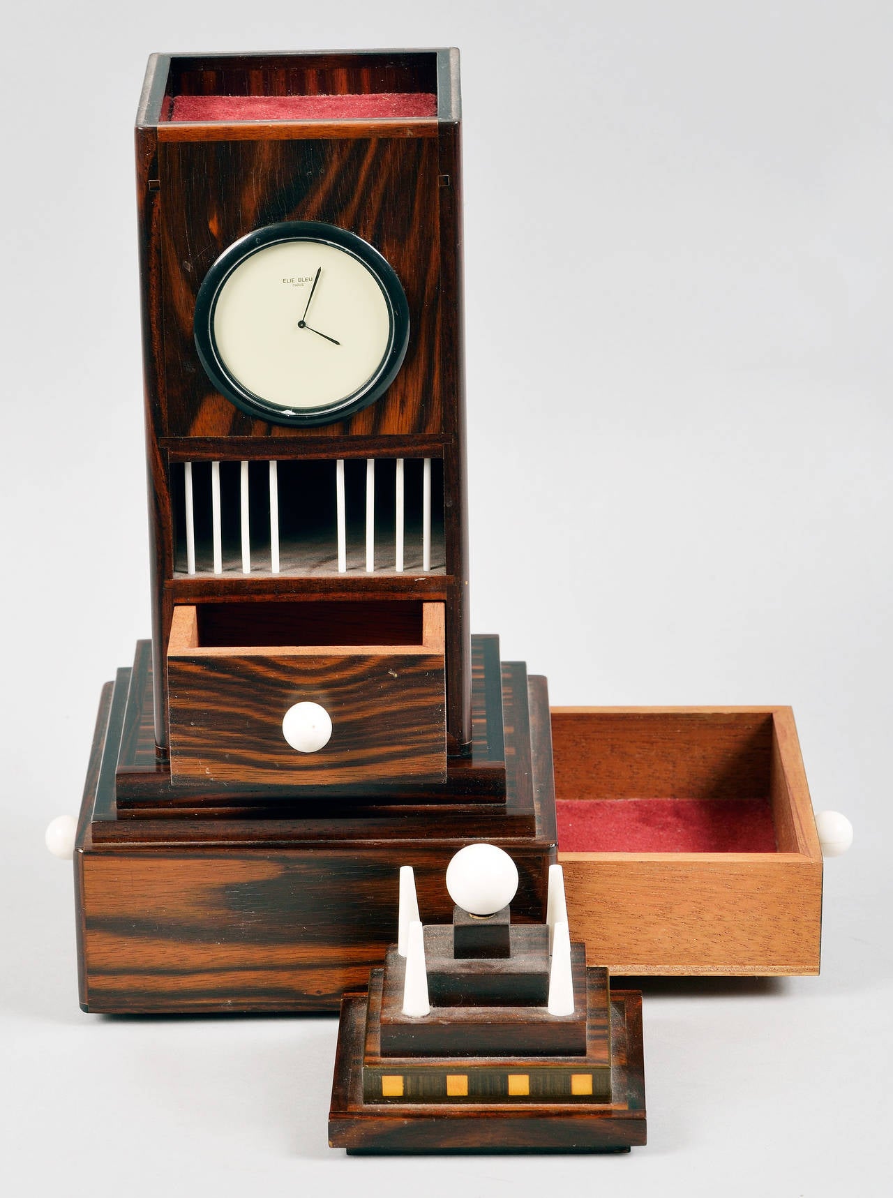 An elegantly constructed incense burner with watch and drawers.
By Elie Bleu, a French 'tabletier