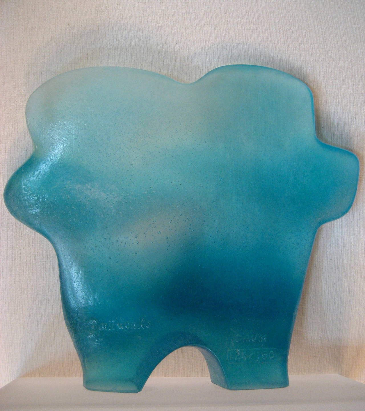 Pierre Dmitrienko, French painter and sculptor, 1925-1974, created in 1968 three sculptures for Daum
Le Couple, Le Cri and L'Ombre du Couple.
Glass pâte de verre blue-turquoise color
numbered 124 on a limited edition of 150.
Double signature