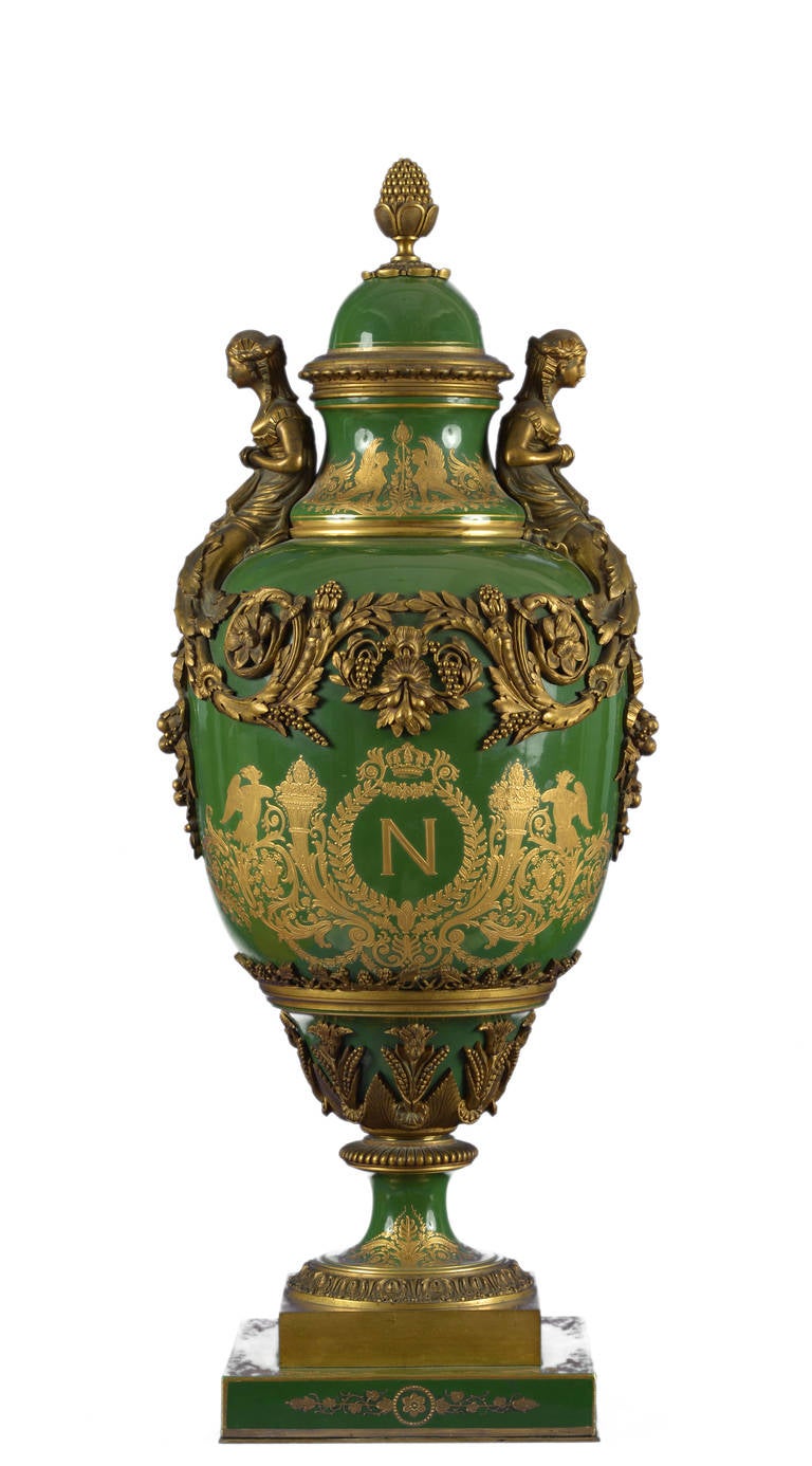 A pair of monumental Sèvres porcelain vases
Ormolu-mounted, green-ground, baluster form with covers and acorn finials
Bearing on the obverse, raised gilt ciphers the French emperor and empress Napoleon Bonaparte and Josephine de Beauharnais
Each