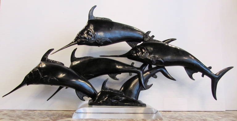 W.A. Lovegrove (20th) Great Britain
Leaping shoal of swordfishes (or marlins)
Art Deco bronze sculpture with black patina
Signed and foundry stamp «Susse Fres Edts Paris»
1920-1930
Condition: minor patina loss.
Plexiglass base
31.2 x 72.4 cm