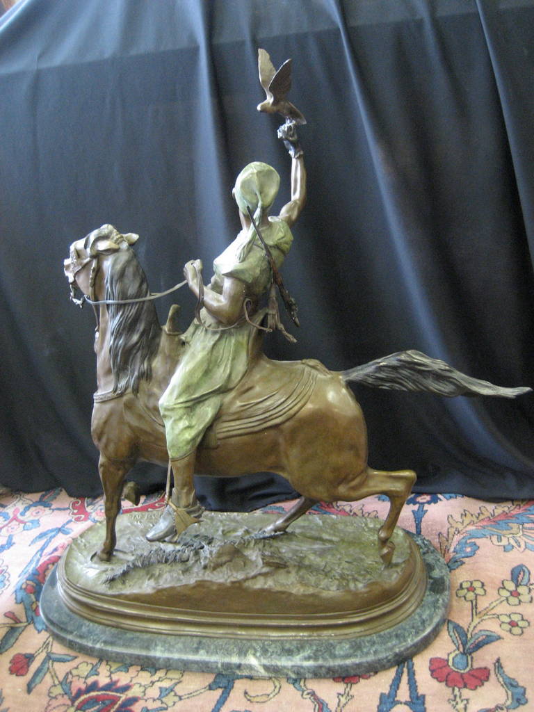 Arab Falconer on horse.
An early 20th century regule recast of a 19th century sculpture by Pierre Jules Mène (French 1810-1879) on marble
Signed 