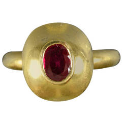 Solitaire Ruby Ring with Oval Set in 18K Yellow Gold