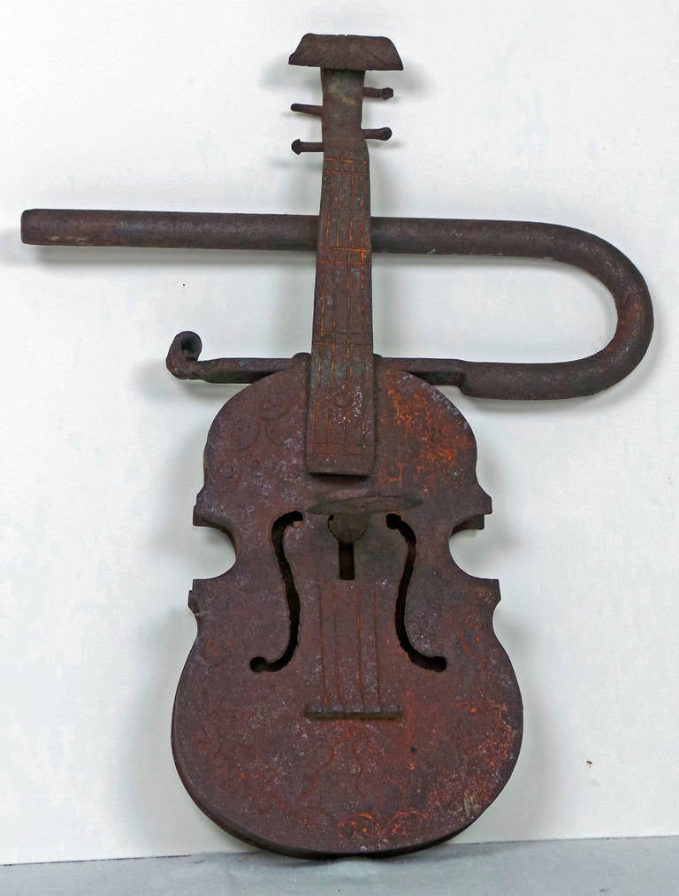 Functioning Mexican violin padlock. Late 19th century hand-forged violin padlock. Made in Mexico. (14 in H x 6 in W x 1 in D).