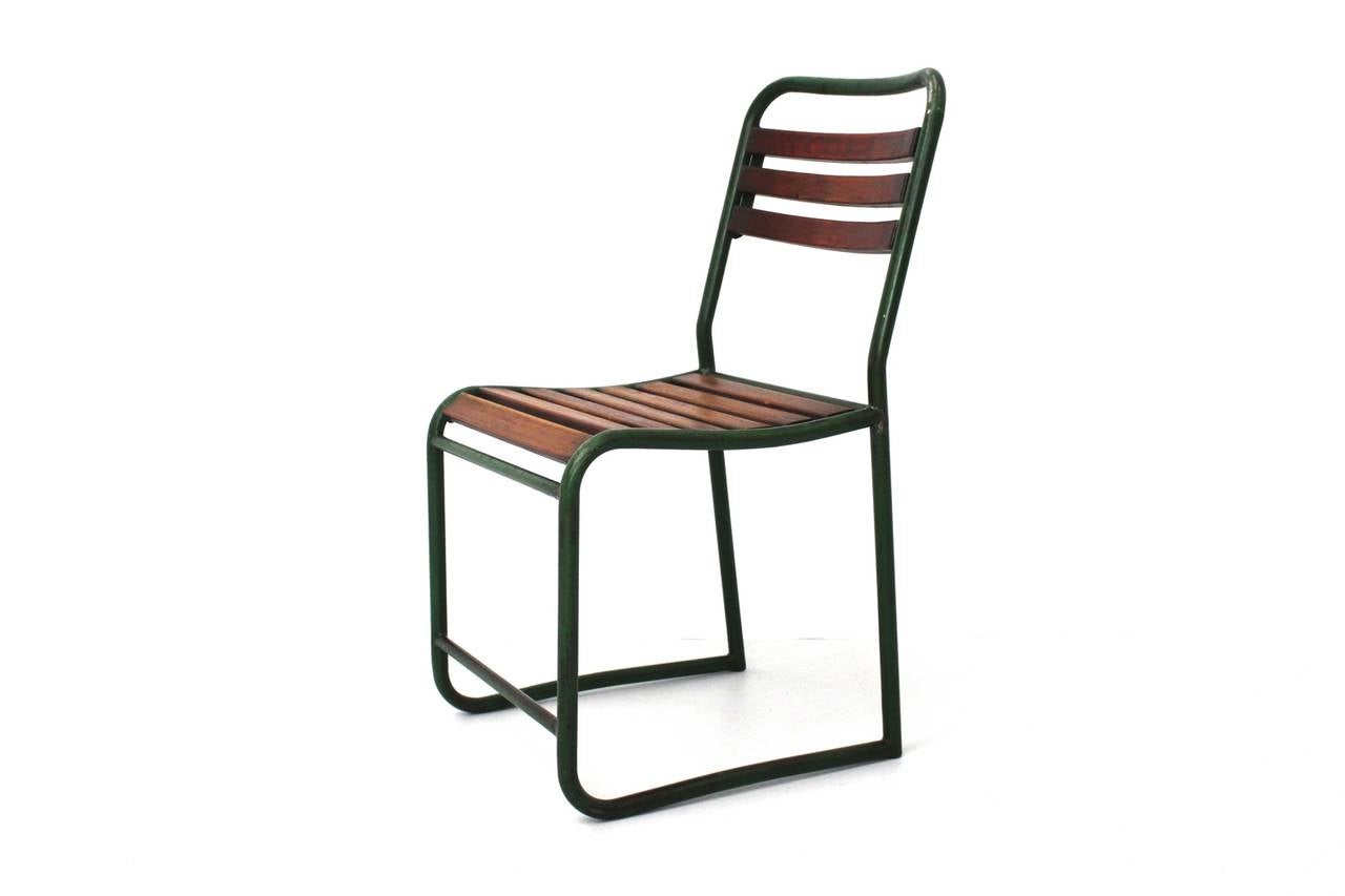 Mid century modern vintage garden chair from green lacquered tubular steel.
Designed for the public bathing beach 