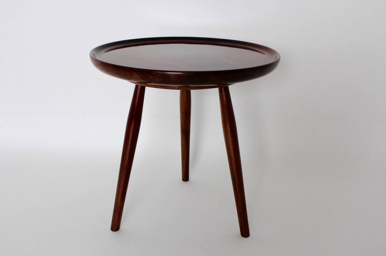 Tripod side table designed by Josef Frank for Haus und Garten, 1925.

The table is made of solid walnut and carefully restored.