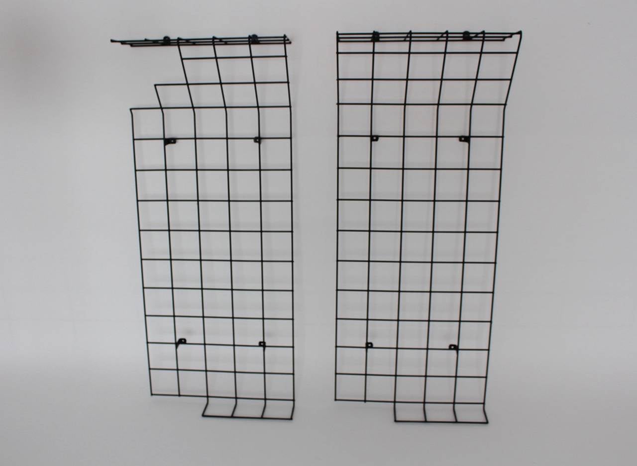 Metal coat racks or coat stands from black lacquered wire steel designed by Karl Fichtel and produced by Drahtwerke Erlau A.G.Aalen, Germany, circa 1955.
Minimalist design from the 1950s, the wall mounted wardrobe could be mixed powerfully with