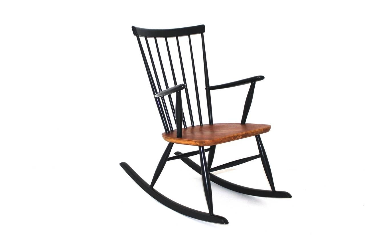 Rocking chair by Roland Rainer and executed by Thonet, Vienna.
Carefully restored: newly black lacquered, seat natural teakwood hand polished