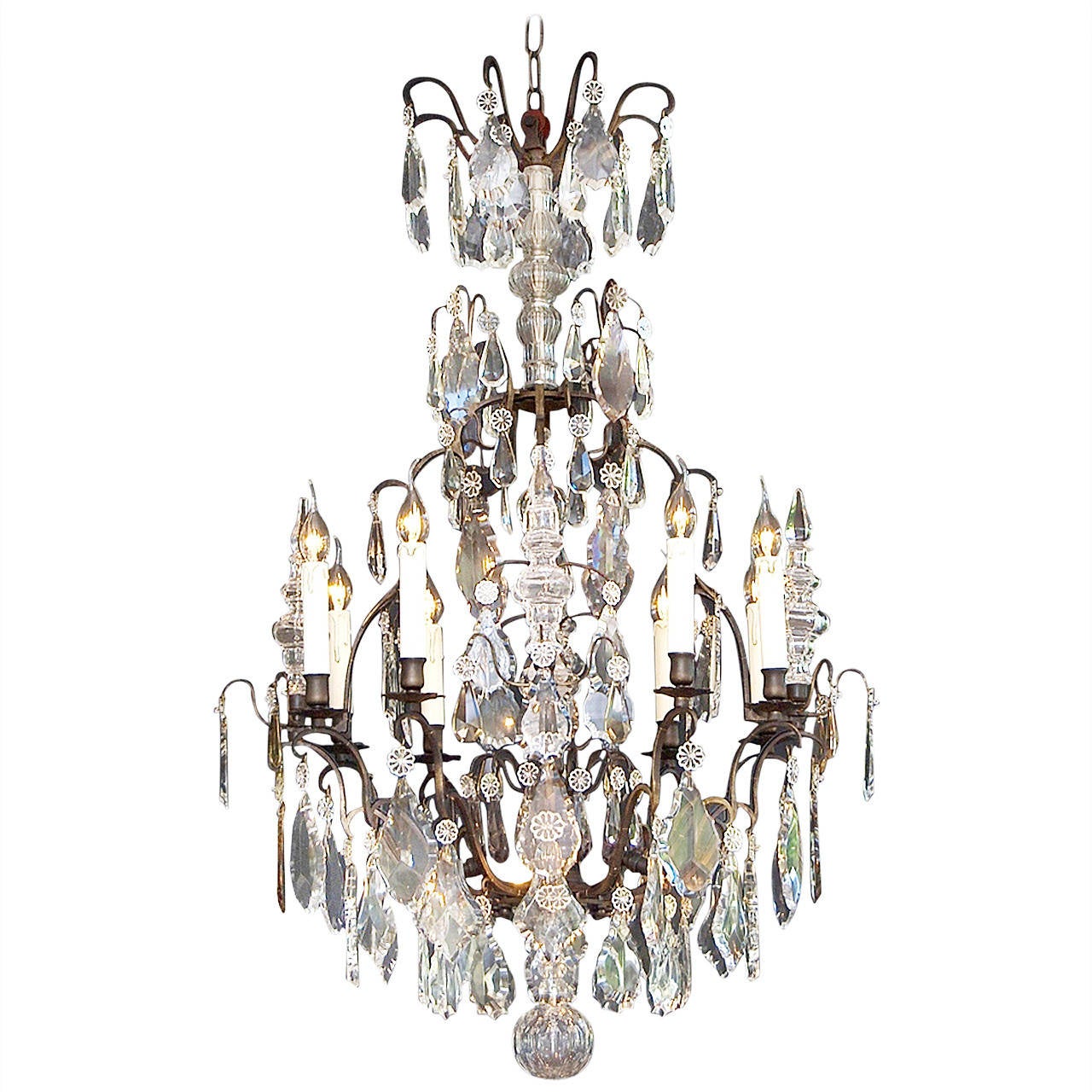 Early 20th Century French Crystal Chandelier with a Dark Patina For Sale