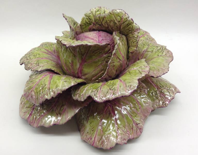 Large centerpiece cabbage in celadon and mauve colors. This is a one of a kind handcrafted piece.
 
Katherine Houston is a living artist working in an 18th century technique, adapting the techniques and masterful creations of the past with a 21st