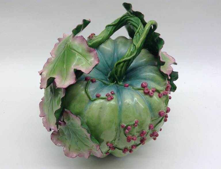 Large melon, over-glazed in Chelsea red anchor period colors with berries and multiple leaves. This is a one of a kind handcrafted piece.
 
Katherine Houston is a living artist working in an 18th century technique, adapting the techniques and