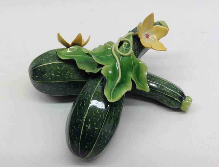 Two zucchinis with blossoms. This is a one of a kind handcrafted piece.
 
Katherine Houston is a living artist working in an 18th century technique, adapting the techniques and masterful creations of the past with a 21st century approach to design