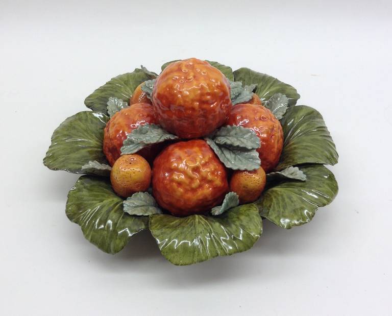 Small centerpiece of oranges and kumquats in flemish colors. This is a one of a kind handcrafted piece.

Katherine Houston is a living artist working in an 18th century technique, adapting the techniques and masterful creations of the past with a