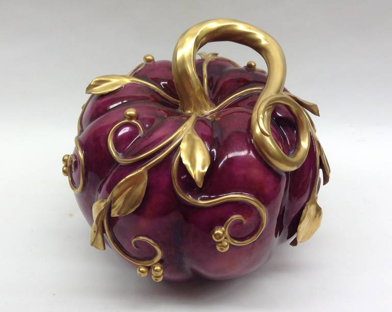 Large Asian inspired melon in deep ruby colors enhanced with 24-karat gold stem and vines. This is a one of a kind handcrafted piece.
  
Katherine Houston is a living artist working in an 18th century technique, adapting the techniques and