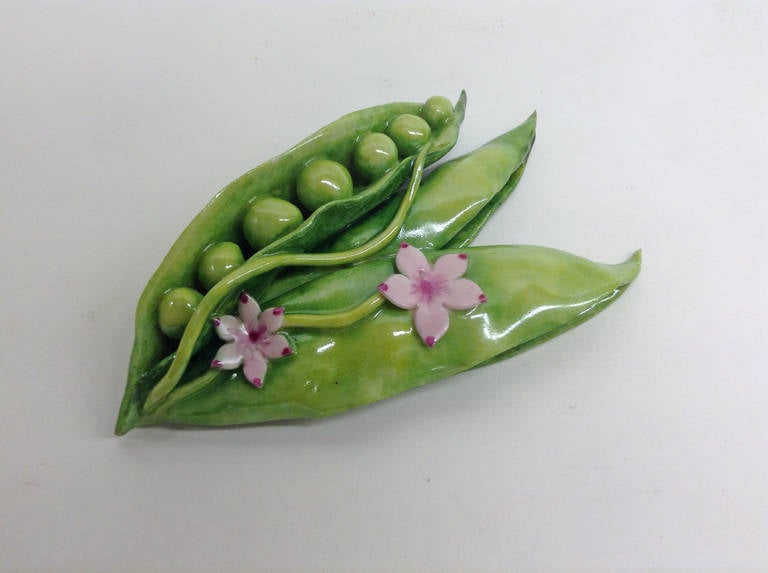 Three open peapods with vine and blossoms. This is a one of a kind handcrafted item.

Katherine Houston is a living artist working in an 18th century technique, adapting the techniques and masterful creations of the past with a 21st century