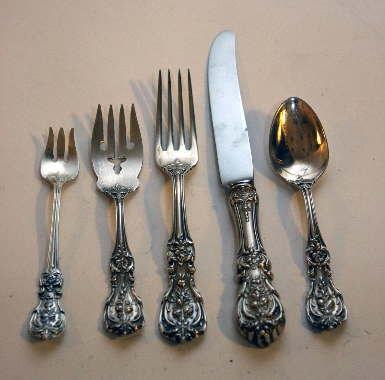 Classic set of Francis I was made by the prestigious firm of Reed and Barton silver company, Taunton, Mass. The sterling silver pattern was introduced in 1907,  (I have also seen idates of 1906 and 1908,) after the design work by Ernest Meyer. His