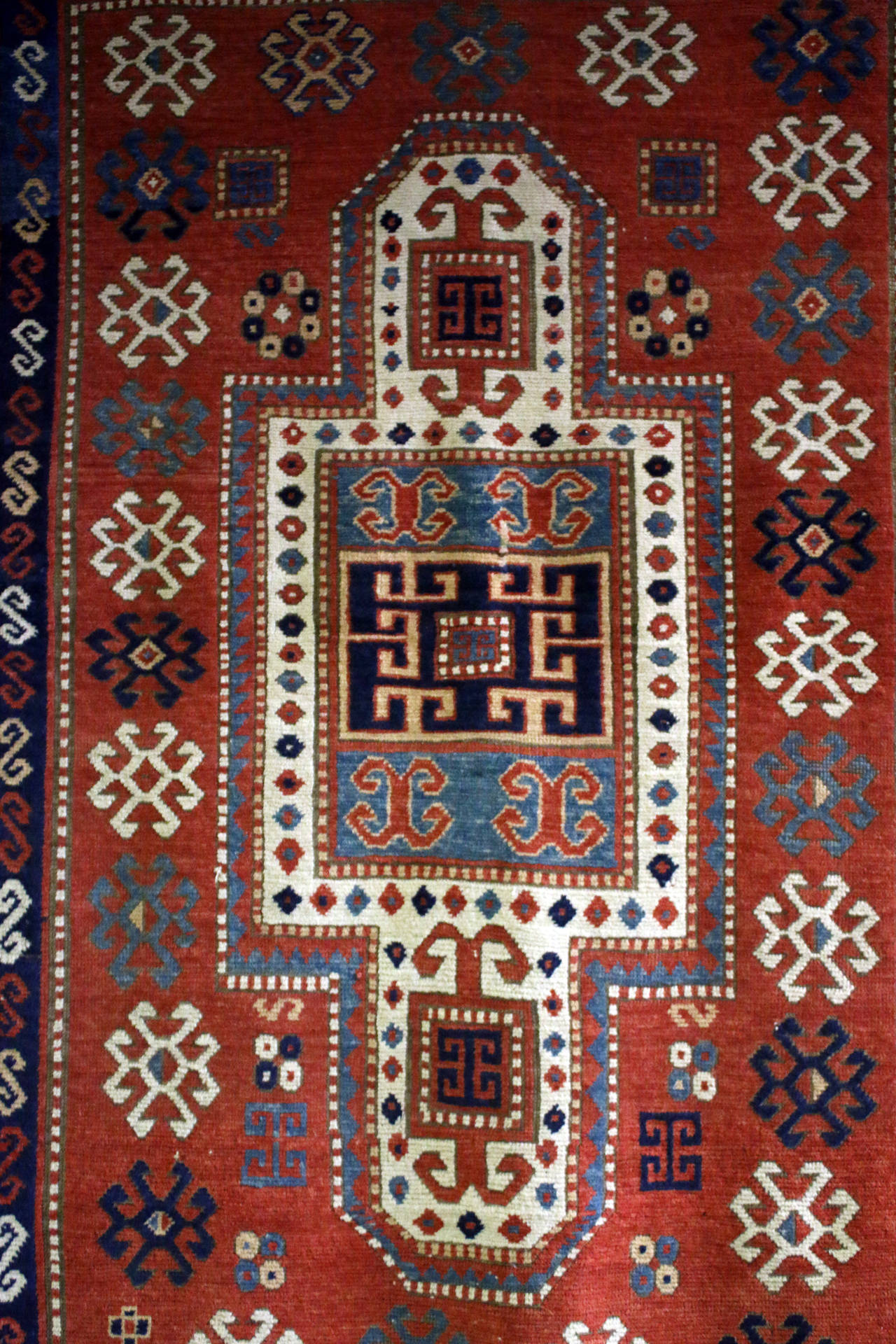 Handwoven by the tribes of Caucasus features an outstanding geometric centerpiece with multiple borders. Gorgeous color.
See measurements below.
