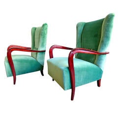 A Pair Of Italian Wing-backed Armchairs