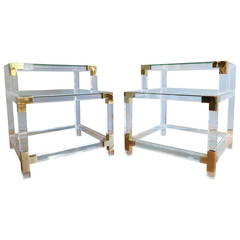 A pair of Lucite side tables