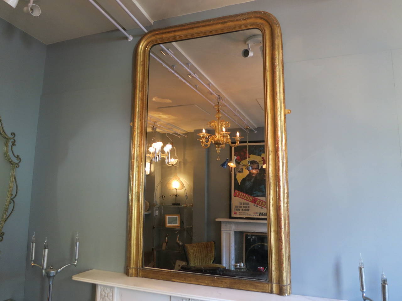 Large French gold gilt domed topped mirror, with original glass. Late 19th century.