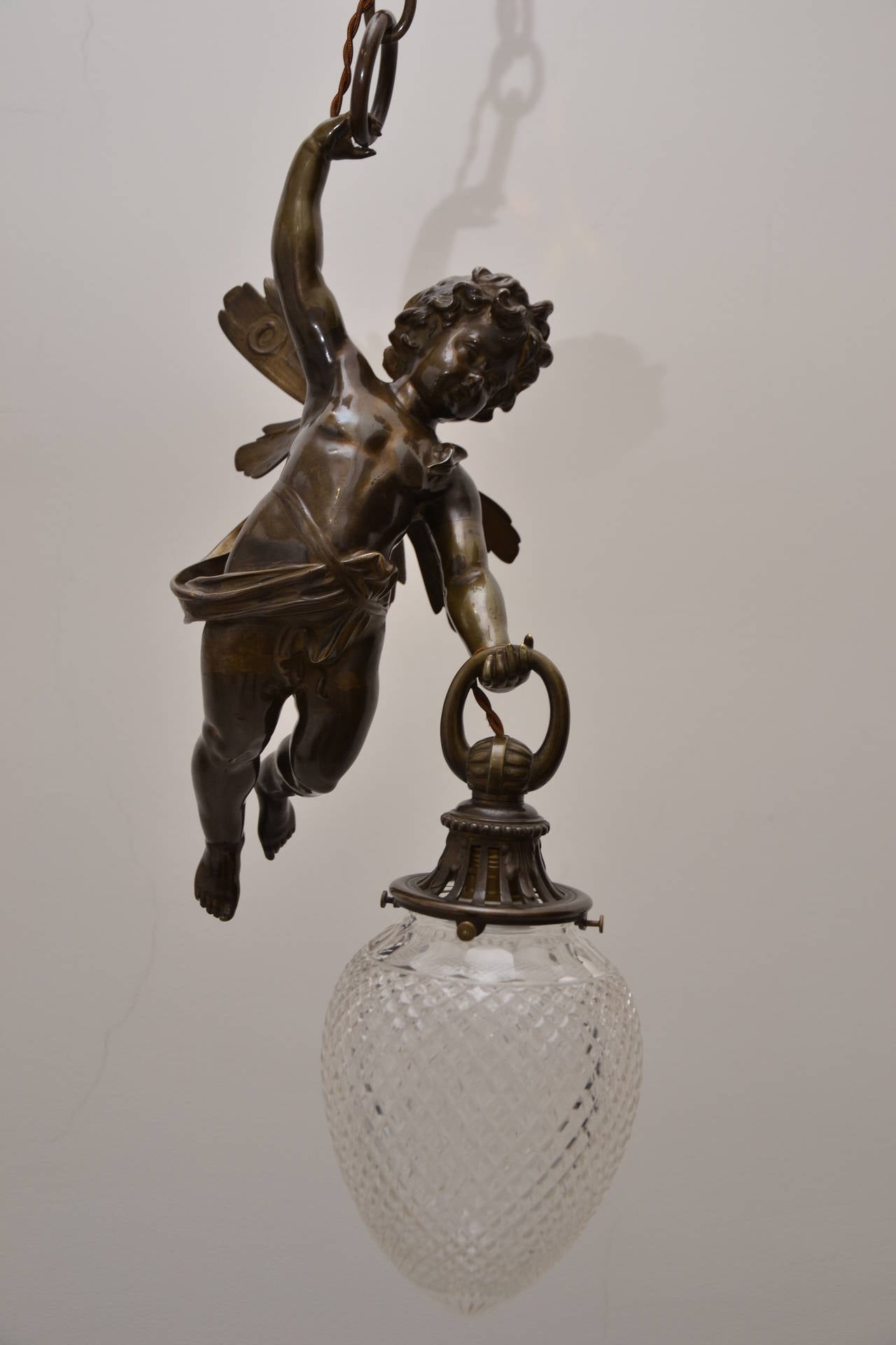 Historistic ciling lamp with an bronze angel figure