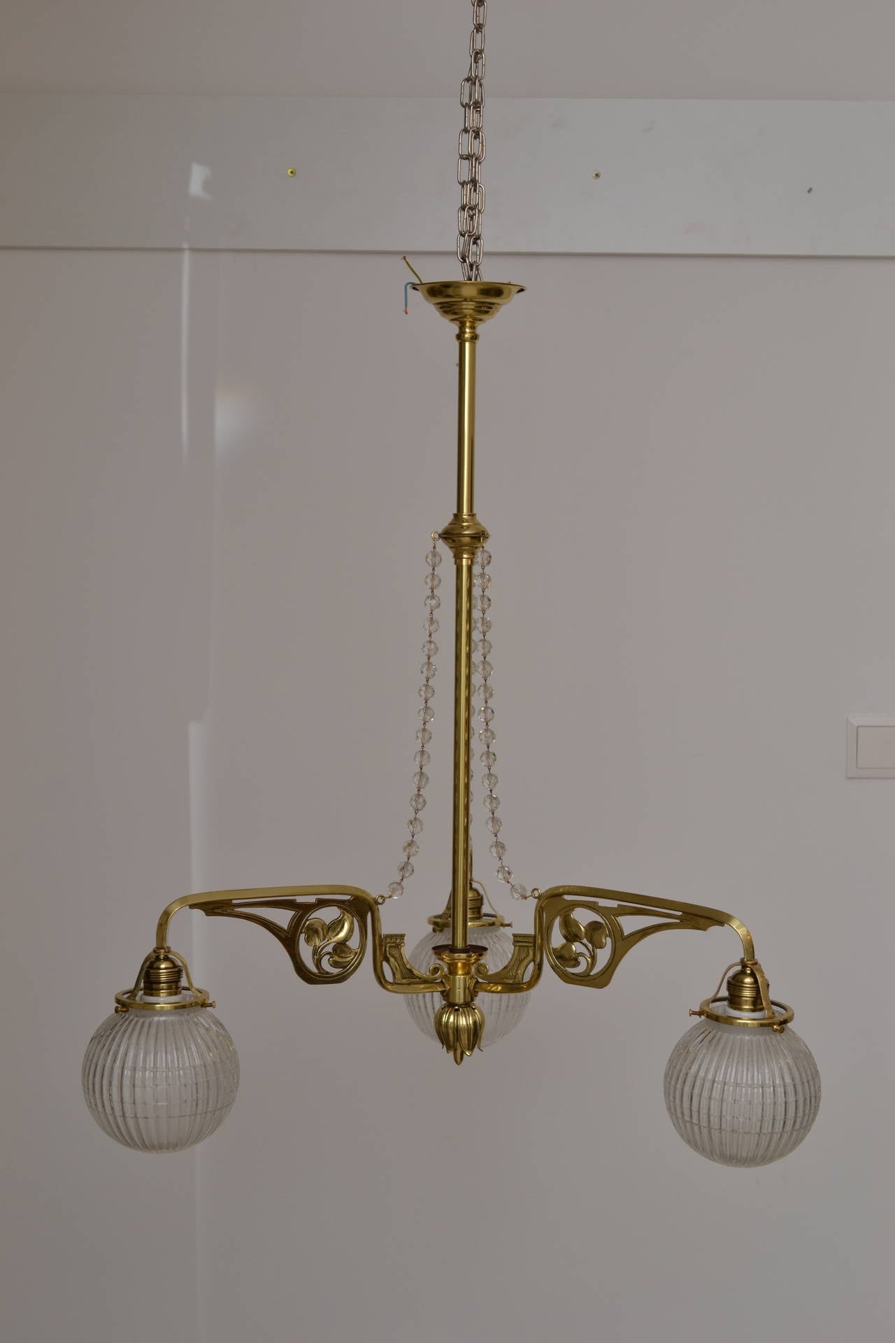 Jugendstil chandelier with original glass balls
Polished and stove enamelled