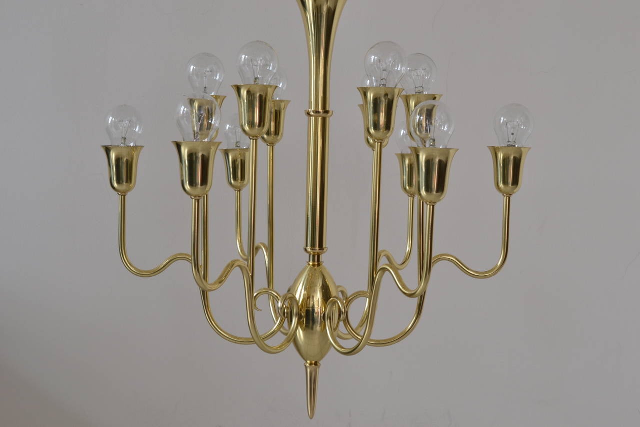 Designed J. T. Kalmar, Vienna, 1950 Chandelier with six arms and twelve bulbs
Polished and stove enameled