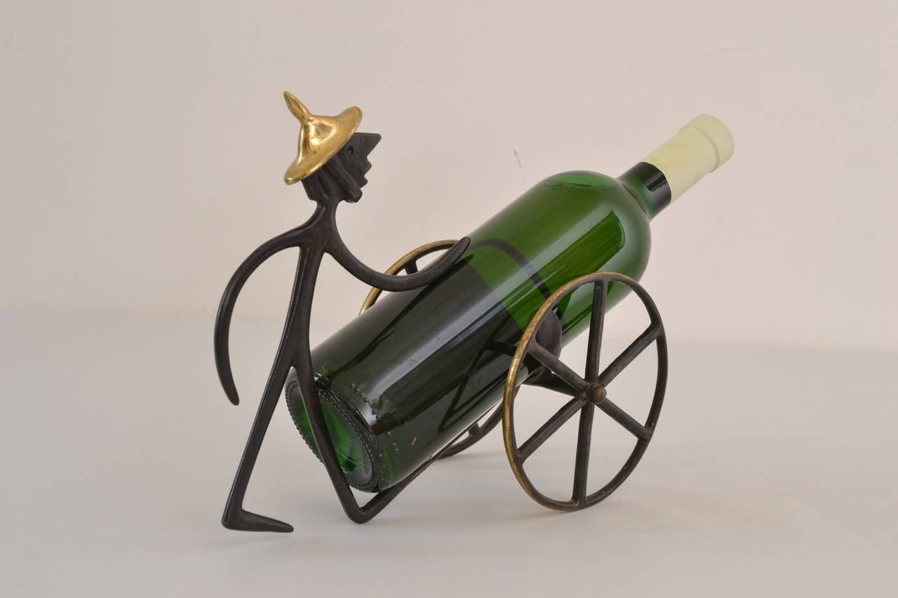 Amazing brass wine bottle holder by Walter Bosse
original condition.