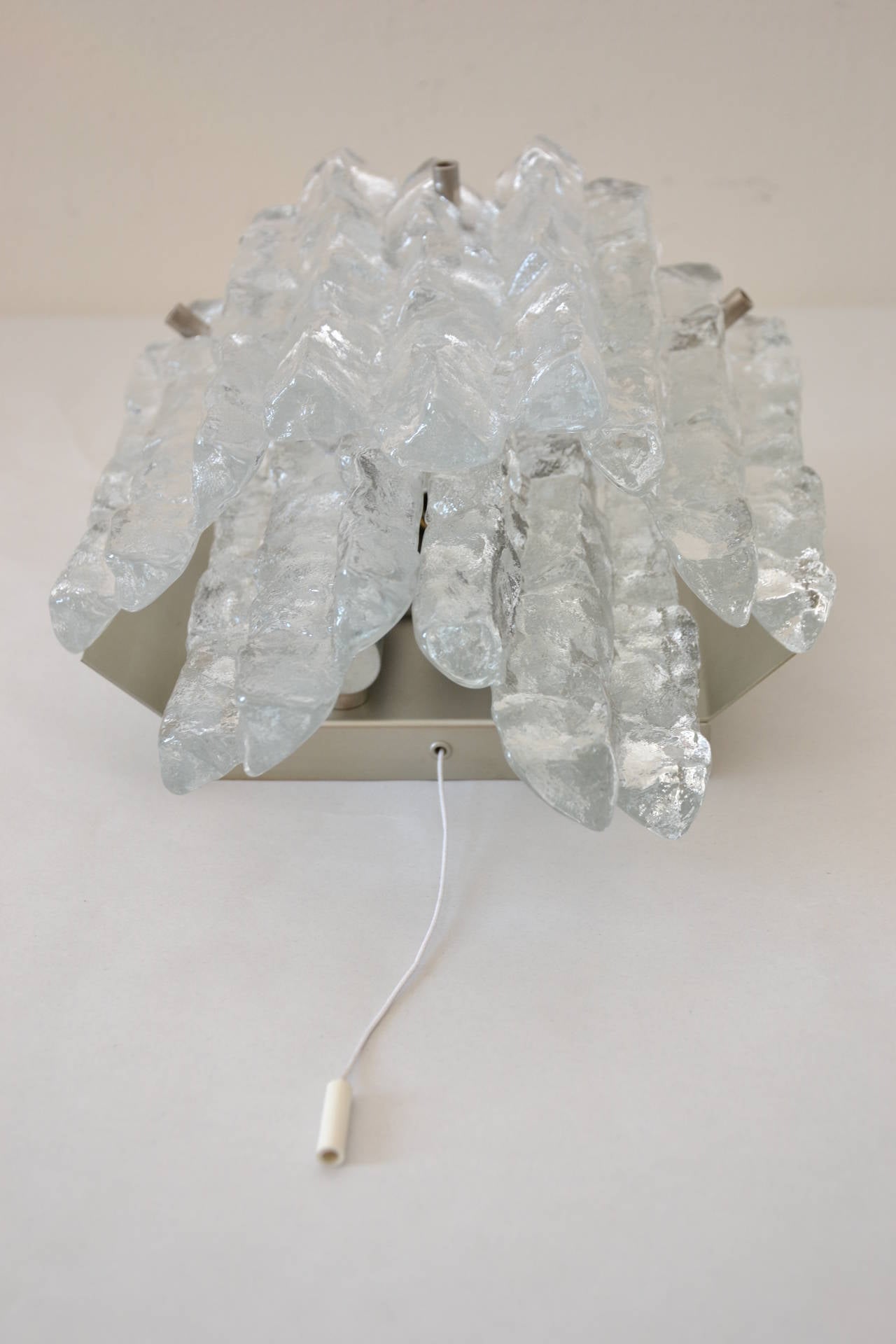 Massive Kalmar Ice Glass sconce
nickel platend