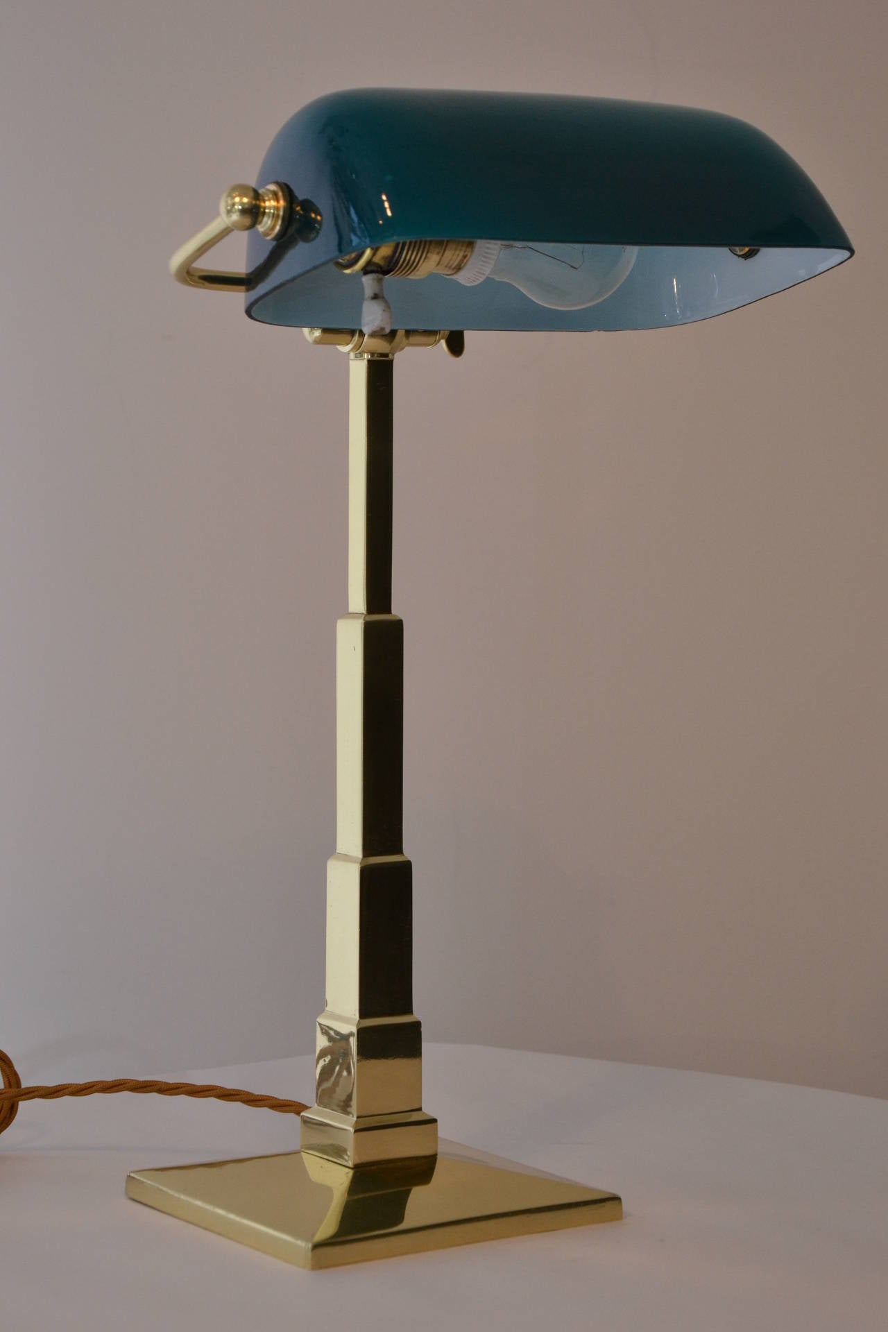 Table lamp brass, polished and stove enamelled.