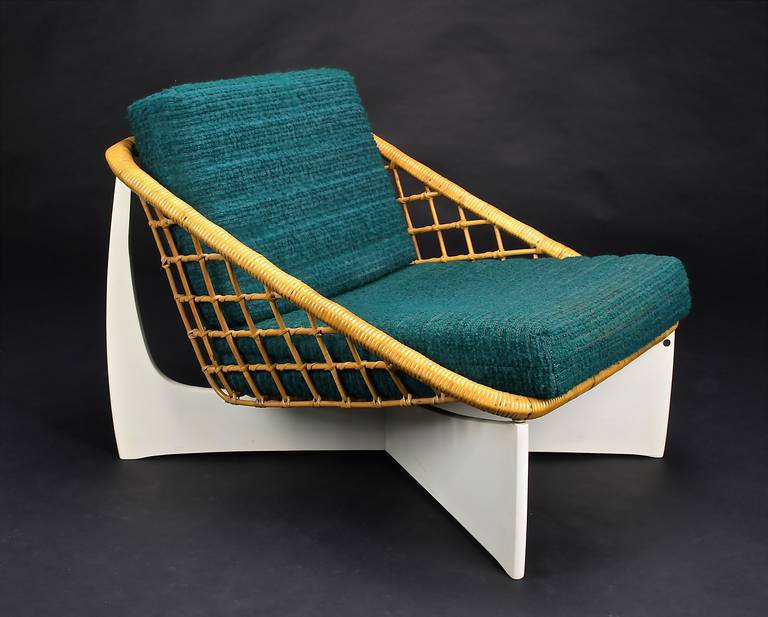 Rare Pastoe lounge chair from the 1960s. Wood and rattan. Upholstry in very good condition.

For competitive delivery quotes and a variety of delivery options and services, ask our in-house shipping department.