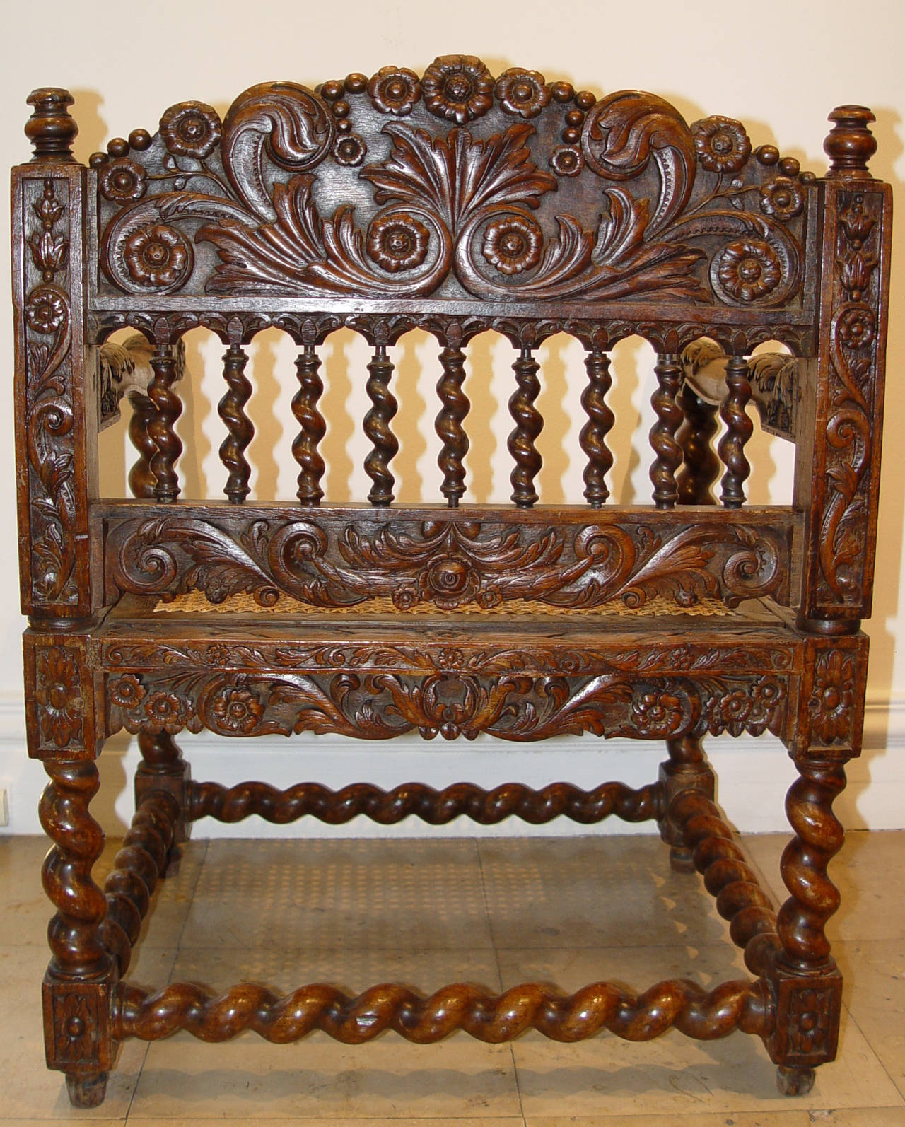 Extremely rare Colonial Indonesian armchair.
Palisander wood,
Batavia, Indonesia,
circa 1680-1720.

Interesting Colonial Indonesian armchair, finely carved in half relief.
Very good condition.
Cane seat and cane frame both replaced.

The