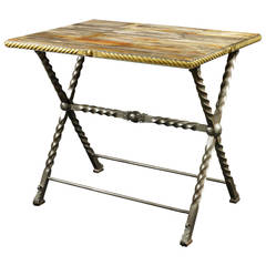 Used French Wrought Iron Table with Fossilized Marble-Like Wood, circa 1800